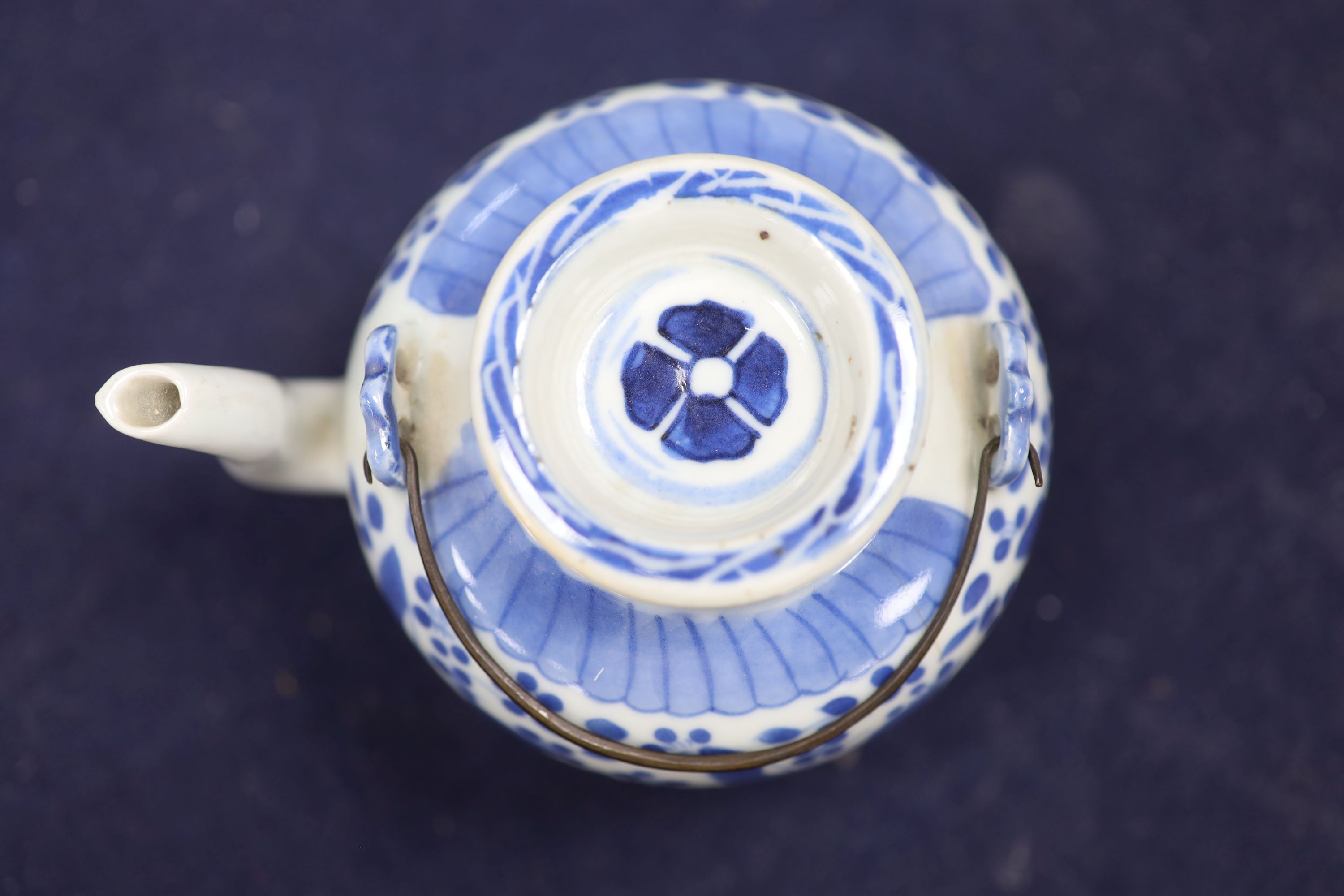 Two 19th century Chinese blue and white moon flasks and a teapot, tallest 21cm